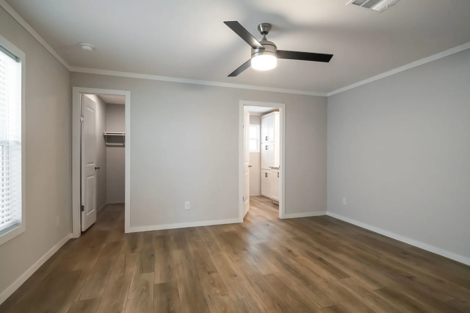 Primary Bedroom of The McAlister tiny home by Tiny Homes USA