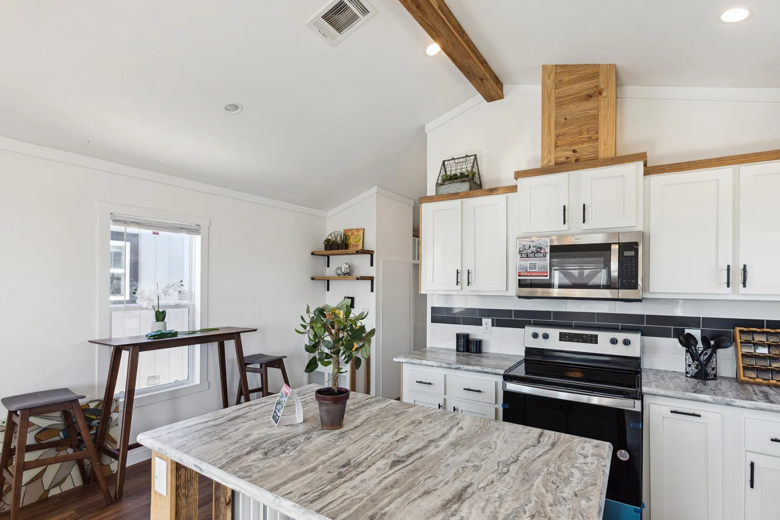 Kitchen of The Mini Mansion tiny home by Tiny Homes USA