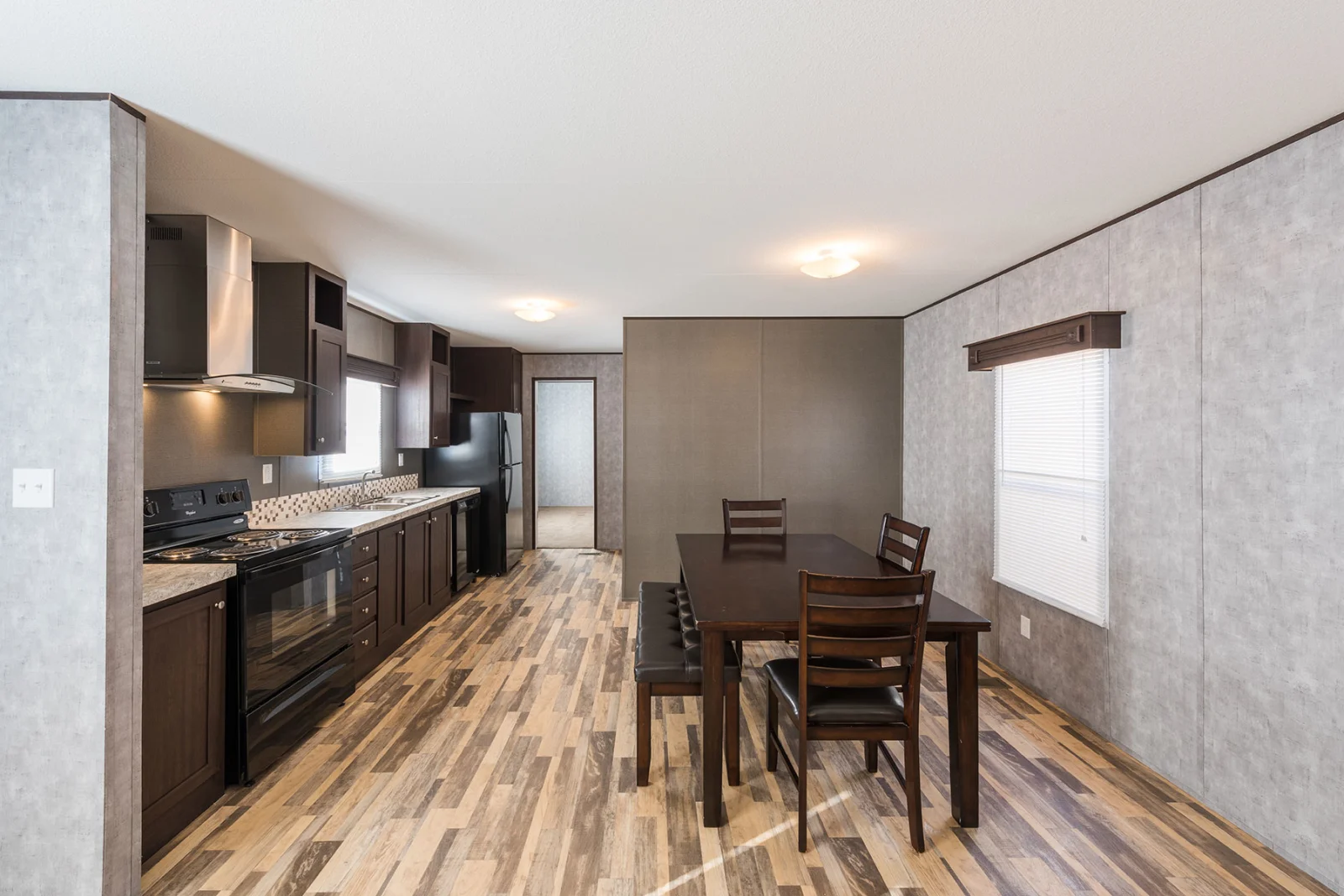 Kitchen And Dining Area of The San Juan tiny home by Tiny Homes USA