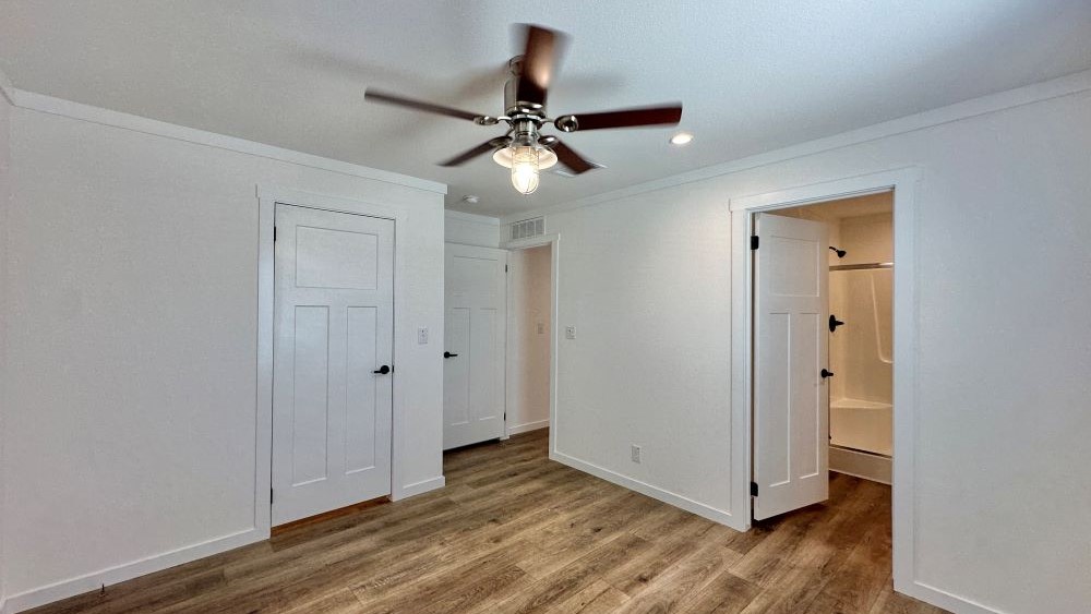Master Bedroom of The stealth tiny home by Tiny Homes USA