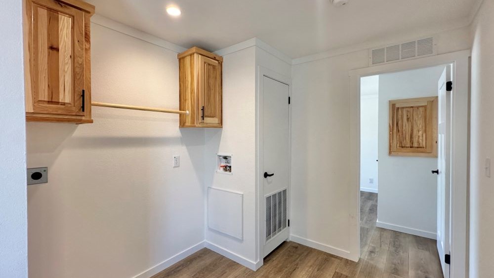 Master Closet of The stealth tiny home by Tiny Homes USA